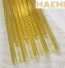 Yellow transparent hot melt glue stick